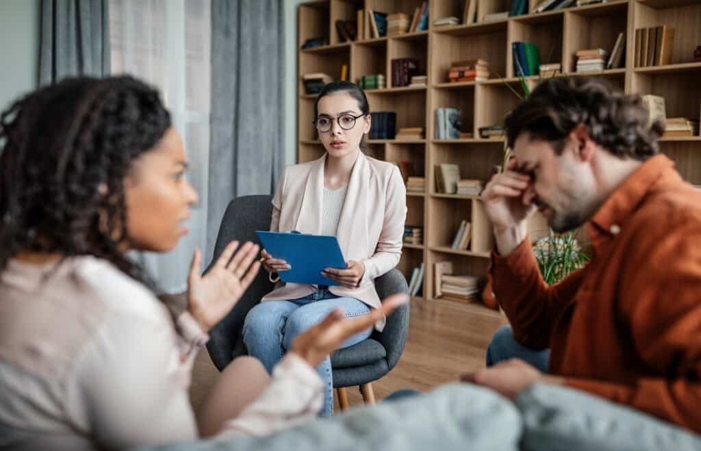 Person recognizing toxic relationship patterns during mental health consultation